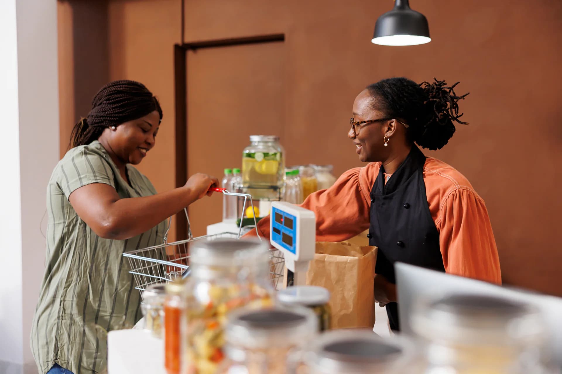 A local business owner serving a customer